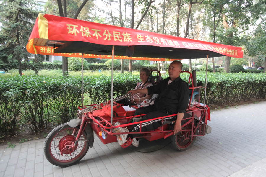 On May 25 in Shenyang, a couple in their 60's set out from their home to begin a worldwide tour on a specially-designed solar pedicab. The couple's plan is to visit over 100 countries in five years. The decision to embark on this unique journey was inspired by the couple’s new interpretation on life after traveling all over China. [Photo/China Daily]