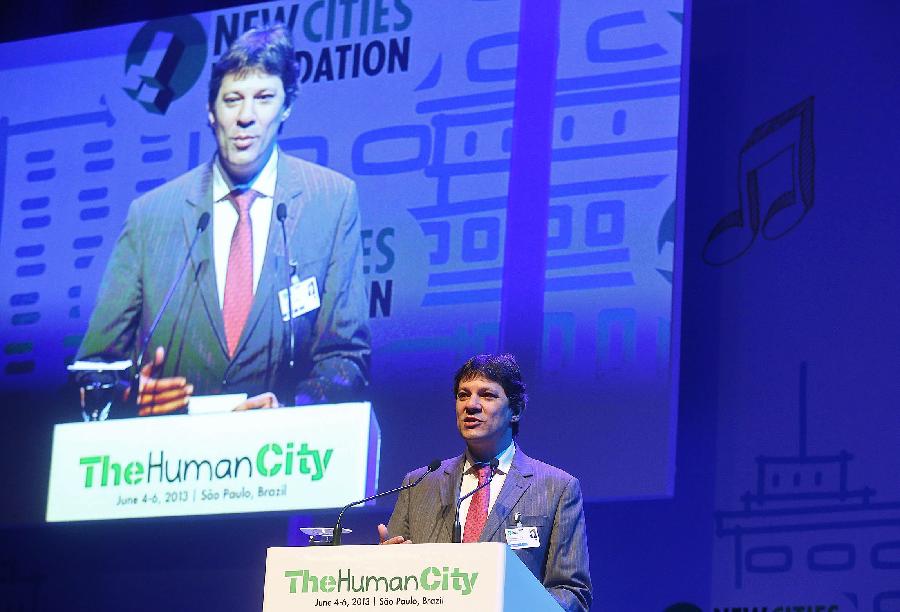 Fernando Haddad, mayor of Sao Paulo, speaks during the opening of the "New Cities Summit 2013-The Human City", in Sao Paulo, Brazil, on June 4, 2013. The event that will be held in Sao Paulo until June 6, brings together experts from around the world to discuss topics such as security, transportation, health and environment in the urban transformation process. (Xinhua/Rahel Patrasso) 