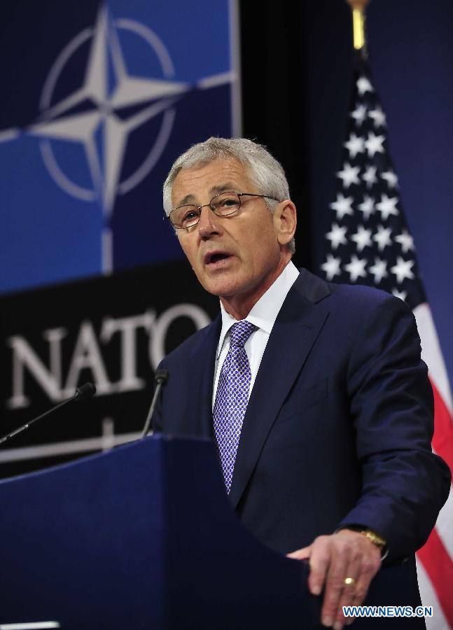 United States Secretary of Defense Chuck Hagel addresses a press conference after two-days NATO Defence Ministers Meeting at its headquarters in Brussels, capital of Belgium, June 5, 2013. (Xinhua/Ye Pingfan)