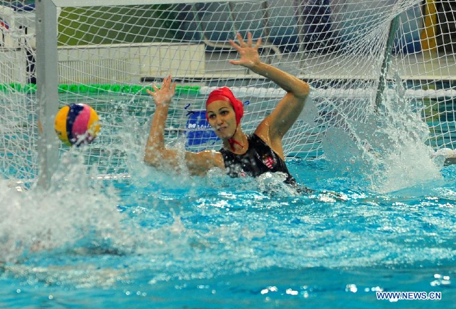 Kaso Orsolya of Hungary competes during the semifinal against Russia at the 2013 FINA Women's Water Polo World League Super Final in Beijing, capital of China, June 5, 2013. Russia won 12-9. (Xinhua/He Changshan)
