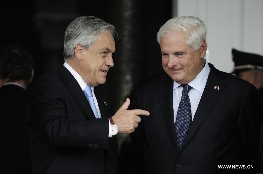 Panamanian President Ricardo Martinelli (R) meets with Chilean President Sebastian Pineira (L) during the official visit of the Chilean leader in Panama City, capital of Panama, on June 5, 2013. Pineira, who is in Panama for a one-day official visit, held talks with his Panemanian counterpart on Wendsday. (Xinhua/Mauricio Valenzuela)