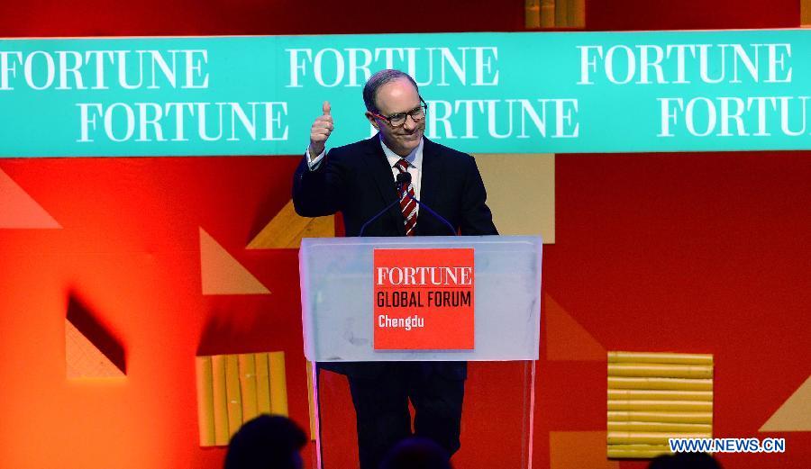 Fortune magazine's managing editor Andy Serwer addresses the opening ceremony of the 2013 Fortune Global Forum in Chengdu, capital of southwest China's Sichuan Province, June 6, 2013. (Xinhua/Jin Liangkuai)