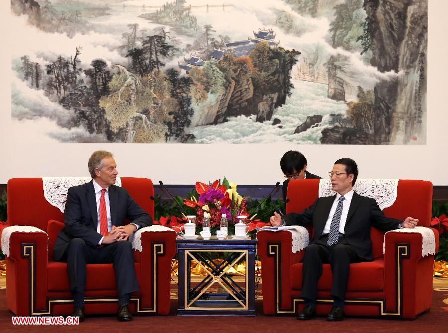 Chinese Vice Premier Zhang Gaoli (R) meets with former British Prime Minister Tony Blair during the 2013 Fortune Global Forum (FGF) in Chengdu, capital of southwest China's Sichuan Province, June 6, 2013. (Xinhua/Pang Xinglei)