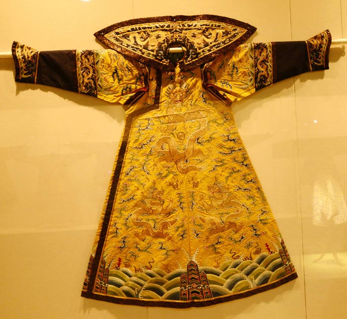 Empress' yellow gauze court robe with embroidered dragons in clouds (China Daily/Ju Chuanjiang)