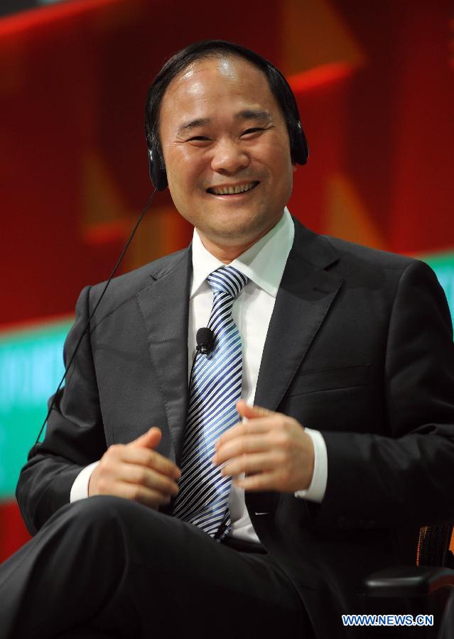 Li Shufu, chairman of the Zhejiang Geely Holding Group, reacts at the discussion "Global Go-To-Market Strategies" during the 2013 Fortune Global Forum in Chengdu, capital of southwest China's Sichuan Province, June 7, 2013. (Xinhua/Xue Yubin)