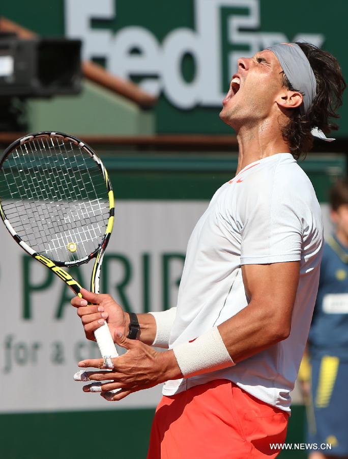Rafael Nadal of Spain celebrates during the men's singles semi-final match against Novak Djokovic of Serbia at the French Open tennis tournament in Paris June 7, 2013. Nadal won 3-2. (Xinhua/Gao Jing)