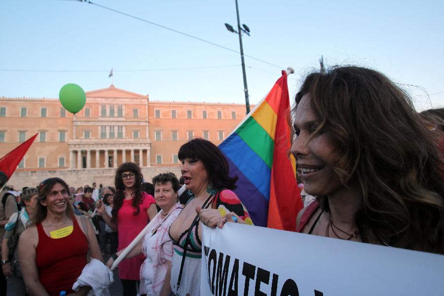 People take part in the 9th Gay Pride Festival in Athens, Greece, on June 8, 2013. (Xinhua/Marios Lolos)