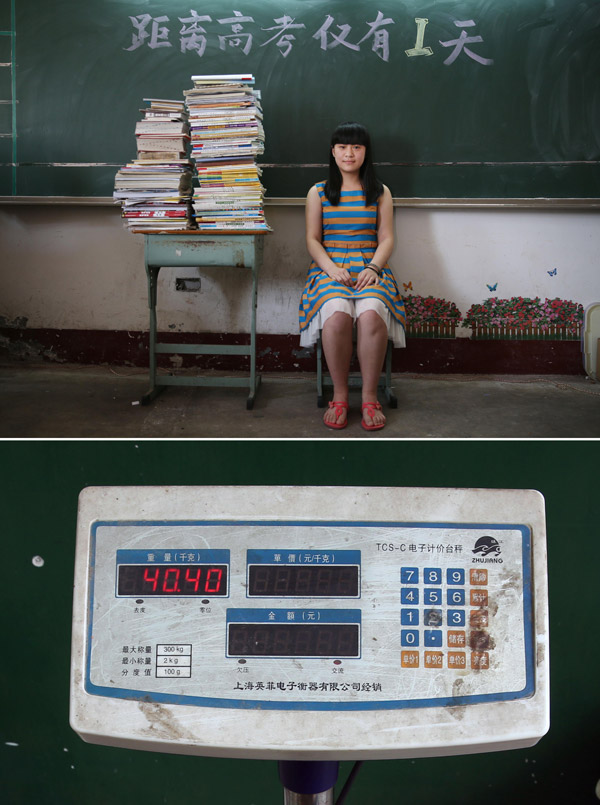 Li Zimeng, 18, from Dacai high school will attend the National College Entrance Examination in June 2013. Her dream college is Tianjin University of Commerce. An electronic scale showed her textbooks and supplementary materials weighed 40.4 kilometers. (Xinhua/Li Ga)