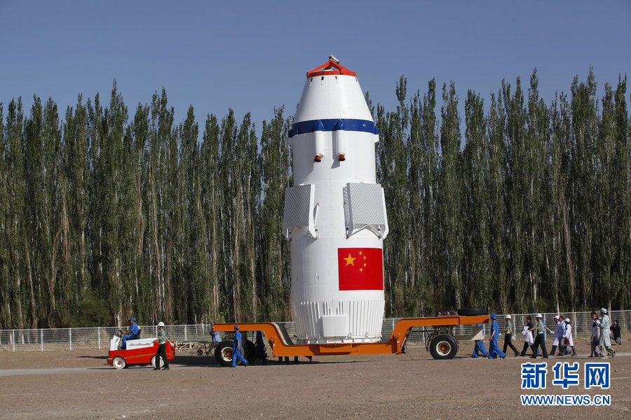 A spokesman from China’s manned space program says the Shenzhou-10 spacecraft will be launched in the middle of this month. The spacecraft will carry three astronauts to the Tiangong-1 space module. The assembly of the Shenzhou-10 spacecraft and the Long March-2F carrier rocket was transported to the launch site on June 3 at Jiuquan Satellite Launch Center in Jiuquan, northwest China's Gansu Province, which marks the manned Shenzhou-10 mission entering the final phase of its preparation. (Source: xinhuanet.com/mil)