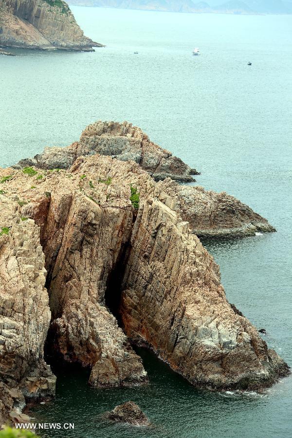 Photo taken on June 9, 2013 shows the scenery of the South Ninepin Island of the Ninepin Group in Hong Kong, south China. The Ninepin Group, or Kwo Chau Islands, is a group of islands in the southeastern Hong Kong. (Xinhua/Li Peng) 