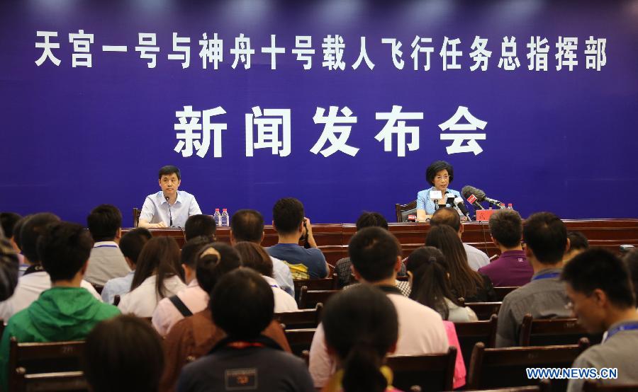 A press conference to brief on the launch of the Shenzhou-10 manned spacecraft is held by China's space program headquarters at the Jiuquan Satellite Launch Center in Jiuquan, northwest China's Gansu Province, June 10, 2013. The Shenzhou-10 manned spacecraft will be launched at the Jiuquan Satellite Launch Center at 5:38 p.m. Beijing Time (0938 GMT) June 11. (Xinhua/Wang Jianmin)
