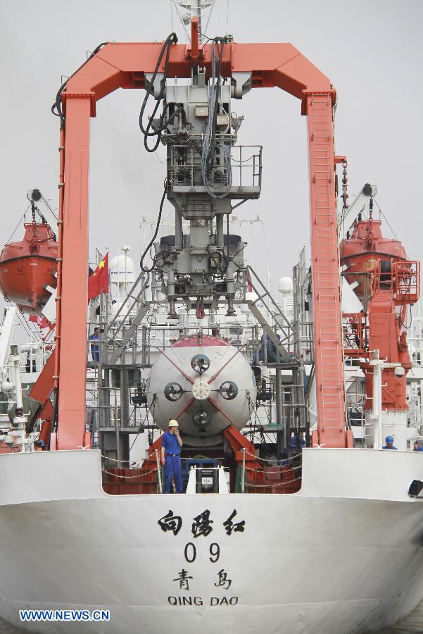 "Xiangyanghong 09", a support ship for China's manned submersible "Jiaolong", leaves a port in Jiangyin, east China's Jiangsu province, June 10, 2013, starting a voyage of experimental application. During the 103-day mission, the sub will submerge for scientific research in the South China Sea, the northeast Pacific Ocean and the west Pacific. The submersible will for the first time take scientists on board. (Xinhua/Chen Jian) 