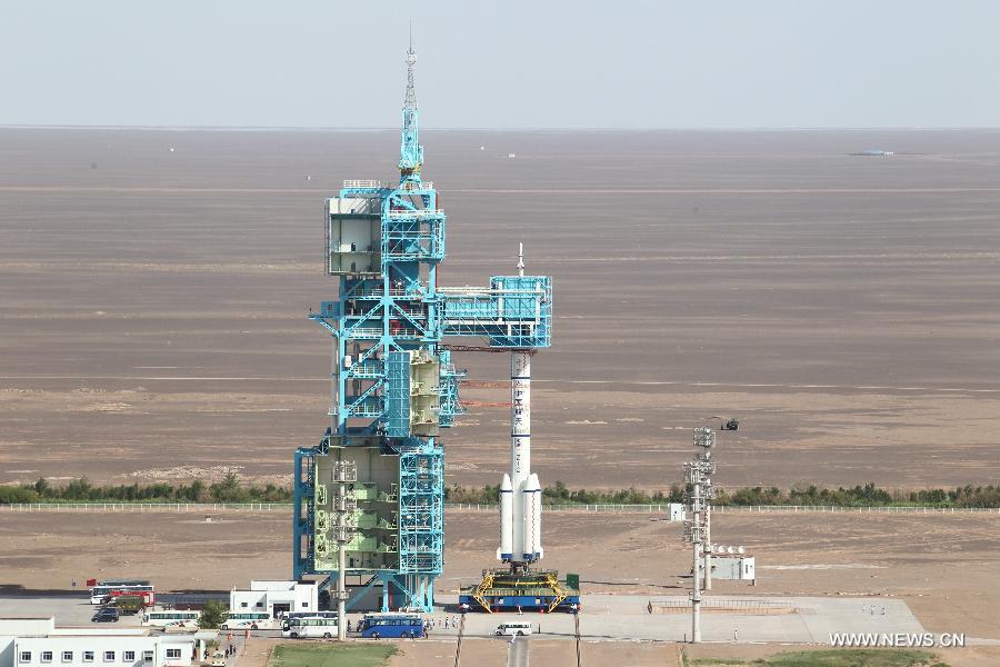 The manned Shenzhou-10 spacecraft is ready for the launch at the Jiuquan Satellite Launch Center in Jiuquan, northwest China's Gansu Province, June 11, 2013. (Xinhua/Wang Jianmin)  