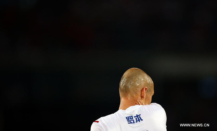 Arjen Robben of the Netherlands reacts during the international friendly soccer match against China at the Workers Stadium in Beijing, capital of China, June 11, 2013. (Xinhua/Li Ming)