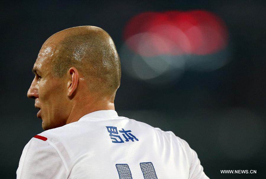 Arjen Robben of the Netherlands reacts during the international friendly soccer match against China at the Workers Stadium in Beijing, capital of China, June 11, 2013. (Xinhua/Li Ming)