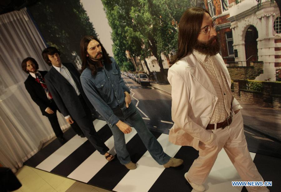 The Beatles' wax figures are exhibited to celebrate the 50th anniversary of their first LP, at Madame Tussauds in Washington D.C., capital of the United States, June 12, 2013. (Xinhua/Fang Zhe) 