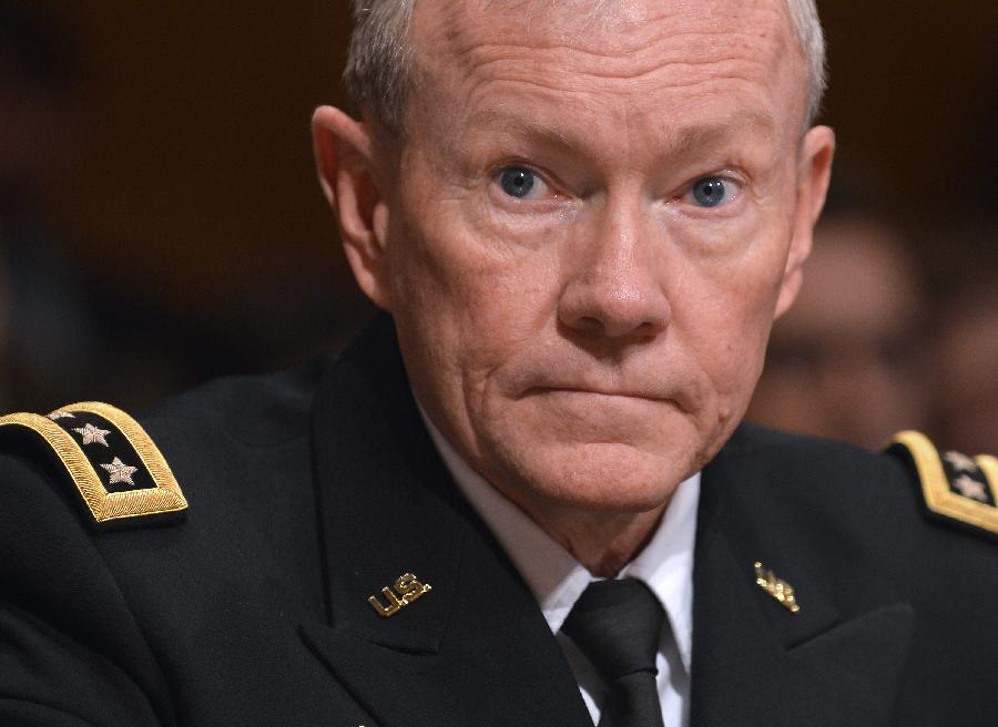 Martin Dempsey, U.S. Chairman of Joint Chiefs of Staff, testifies before the U.S. Senate Budget Committee about U.S. President Barrack Obama's proposed budget request for fiscal year 2014 for defense, on Capitol Hill in Washington D.C., capital of the United States, June 12, 2013. (Xinhua/Zhang Jun) 