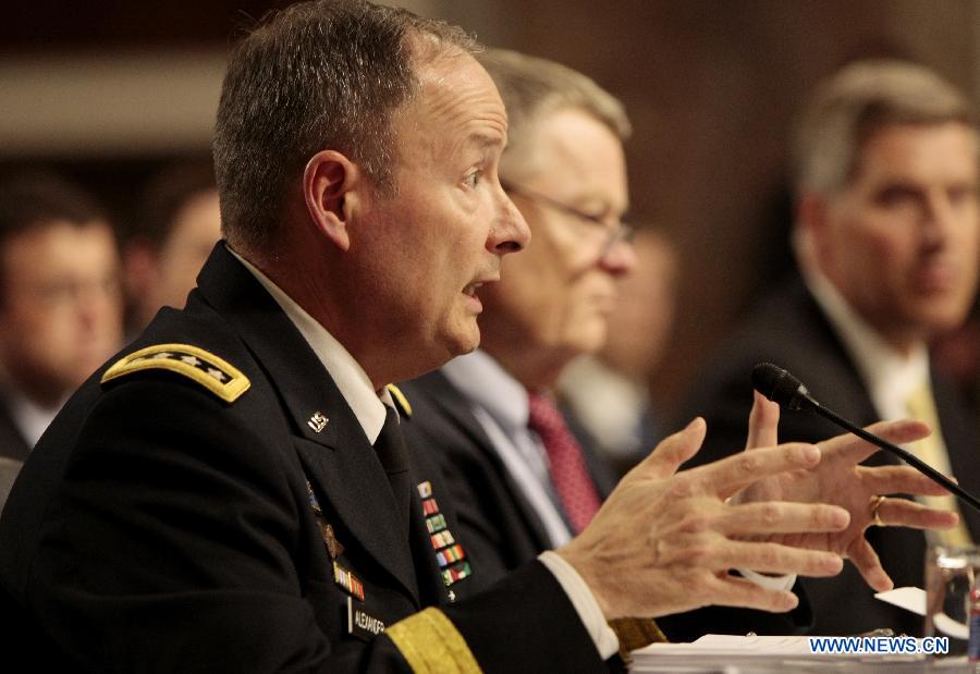 U.S. Army Gen. Keith Alexander, commander of the U.S. Cyber Command, director of National Security Agency (NSA), testifies before a Senate Appropriations Committee hearing in Washington D.C. on June 12, 2013. (Xinhua/Fang Zhe) 