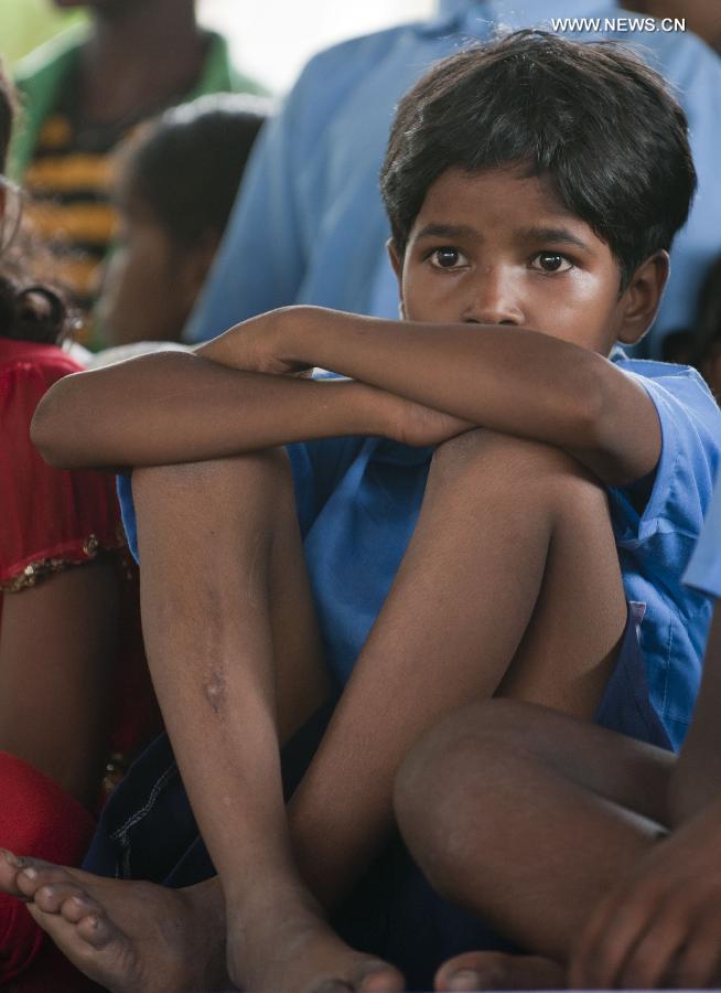 An Indian rescued child laborer attends an awareness rally in Calcutta, Capital of eastern Indian state West Bengal, June 12, 2013. According to the International Labor Organization (ILO), an estimated 10.5 million children worldwide work as domestic workers. (Xinhua/Tumpa Mondal) 
