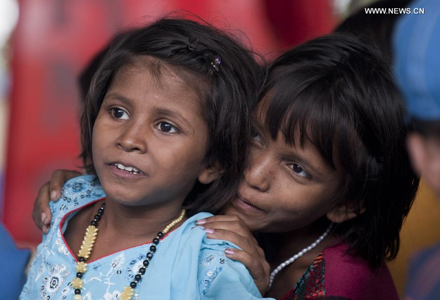Indian rescued child laborers attend an awareness rally in Calcutta, Capital of eastern Indian state West Bengal, June 12, 2013. According to the International Labor Organization (ILO), an estimated 10.5 million children worldwide work as domestic workers. (Xinhua/Tumpa Mondal) 