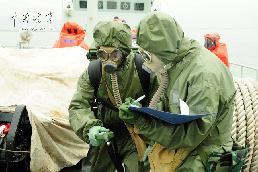 China's first maritime NBC emergency rescue team under a submarine base of the North Sea Fleet of Chinese navy conducts training in a sea area. The training subjects included real-time monitoring, sample collection and analysis and contaminated areas delineation. (China Military Online/Yu Hang, Yu Haitao)