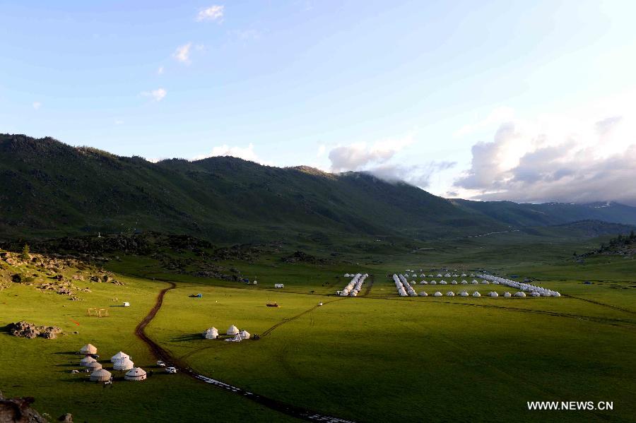 Photo taken on June 11, 2013 shows yurts of Kazak ethnic group on the Argonne Ghet grassland in Burqin County, northwest China's Xinjiang Uygur Autonomous Region, June 11, 2013. (Xinhua/Sadat)