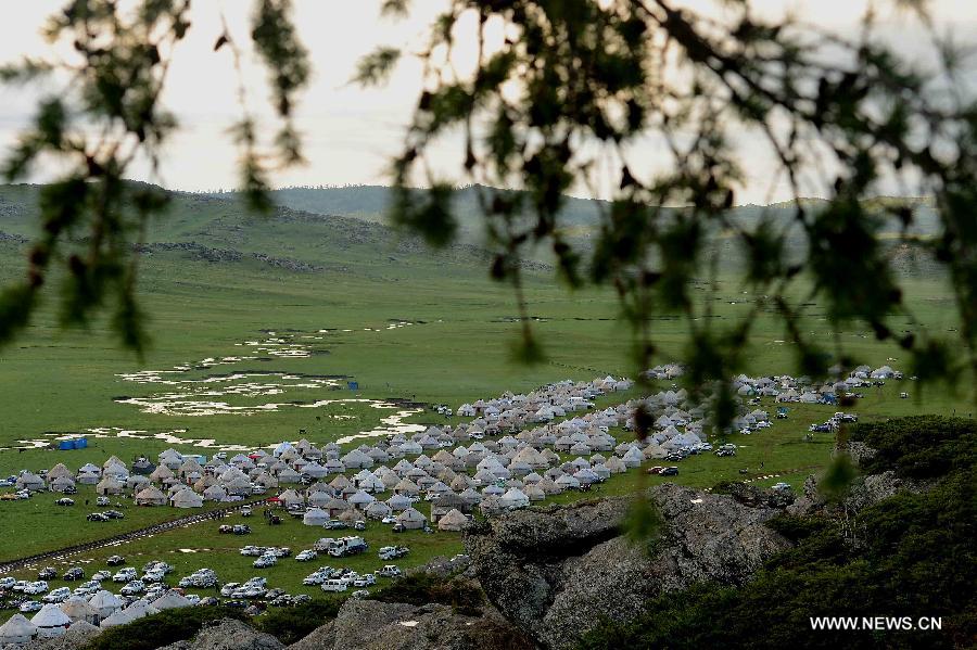 Photo taken on June 11, 2013 shows the scenery of the Argonne Ghet grassland in Burqin County, northwest China's Xinjiang Uygur Autonomous Region, June 11, 2013. (Xinhua/Sadat)