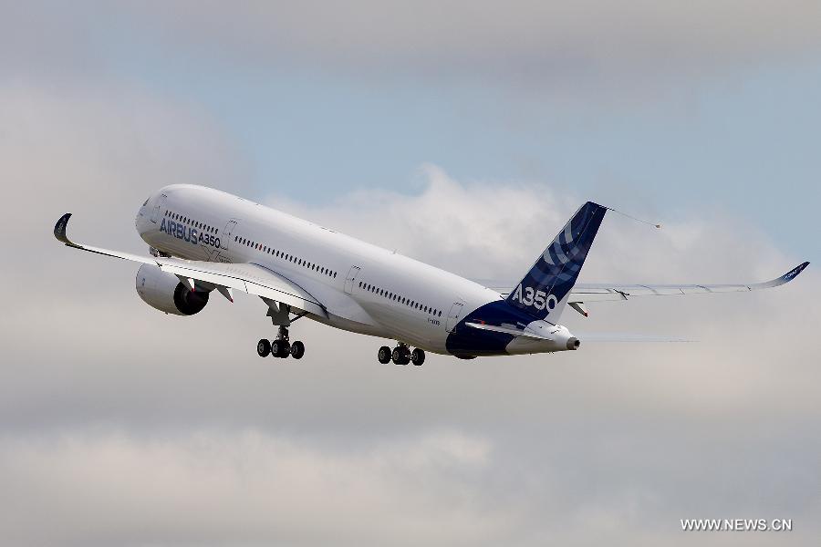 Airbus's A350 XWB (eXtra Wide Body) plane takes off from Toulouse-Blagnac airport, southwestern France, on its first test flight on June 14, 2013. The A350 XWB is Airbus' all-new mid-size long range product line. To date it has already won 613 firm orders from 33 customers worldwide. (Xinhua/Chen Cheng)