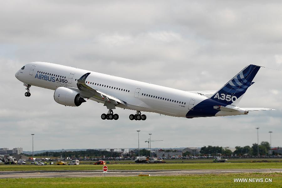 Airbus's A350 XWB (eXtra Wide Body) plane takes off from Toulouse-Blagnac airport, southwestern France, on its first test flight on June 14, 2013. The A350 XWB is Airbus' all-new mid-size long range product line. To date it has already won 613 firm orders from 33 customers worldwide. (Xinhua/Chen Cheng)