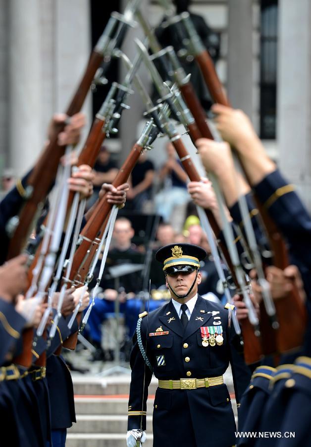 The U.S. Army Drill Team members perform at United States Army 238th Birthday Celebration during the Army Week which made up of veterans, reservists, military spouses and committed community members, in New York, the United States, June 14, 2013. (Xinhua/Wang Lei)