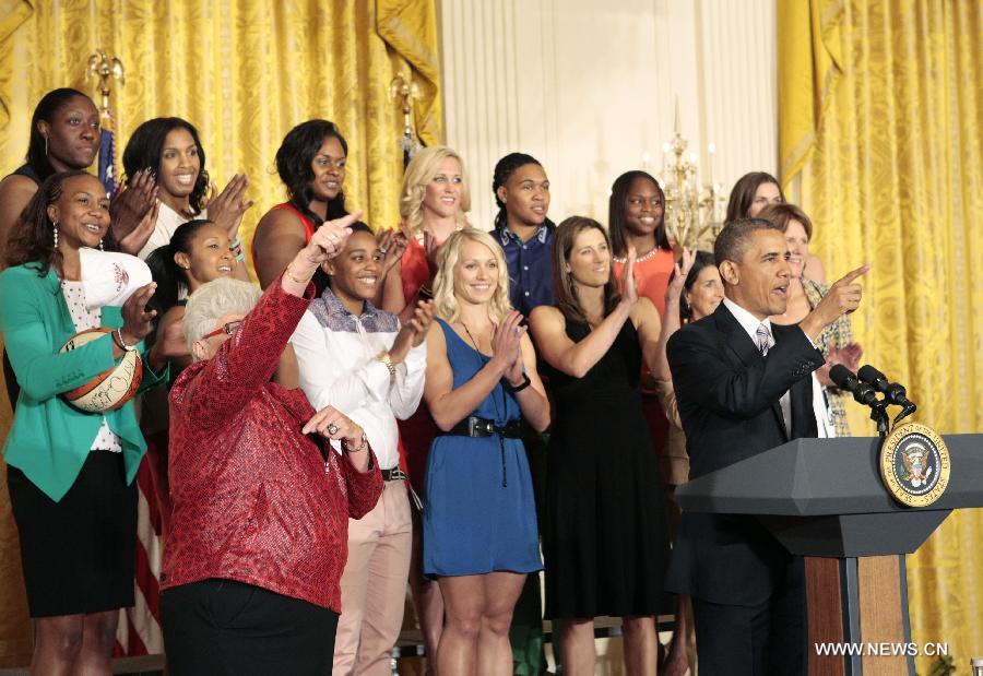 U.S. President Barack Obama (front R) speaks during the welcome ceremony of WNBA champion Indiana Fever at the White House in Washington D.C. on June 14, 2013. (Xinhua/Fang Zhe)