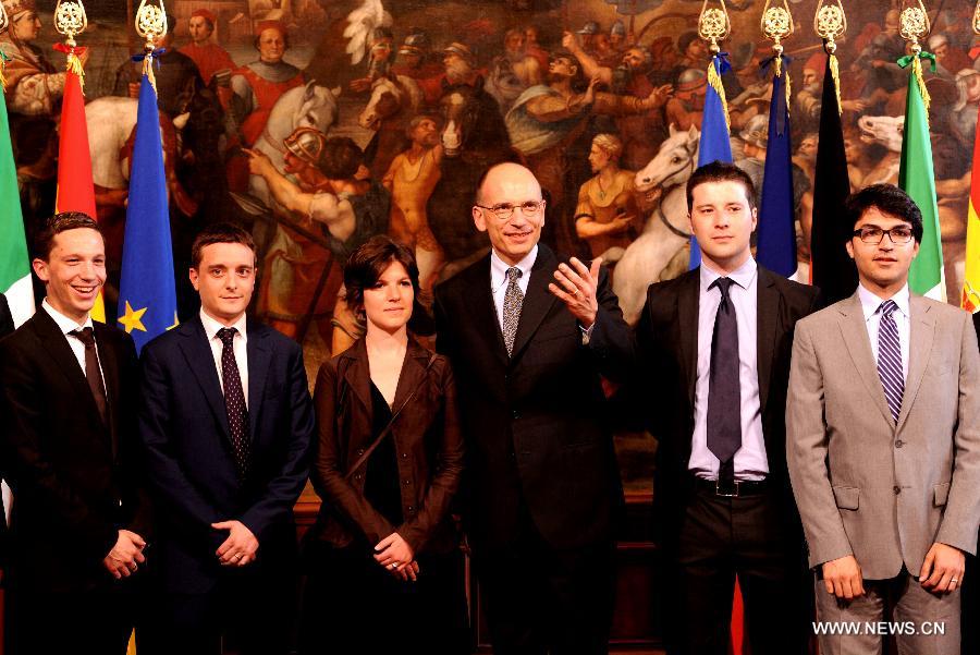 Italian Prime Minister Enrico Letta meets with youth representatives in Rome, Italy, June 14, 2013. A rapid improvement in the labor market to return Europe's stumbling economy to growth was at the center of a summit on jobs held in Rome on Friday by economic and labor ministers from Italy, France, Germany and Spain. (xinhua/Xu Nizhi) 