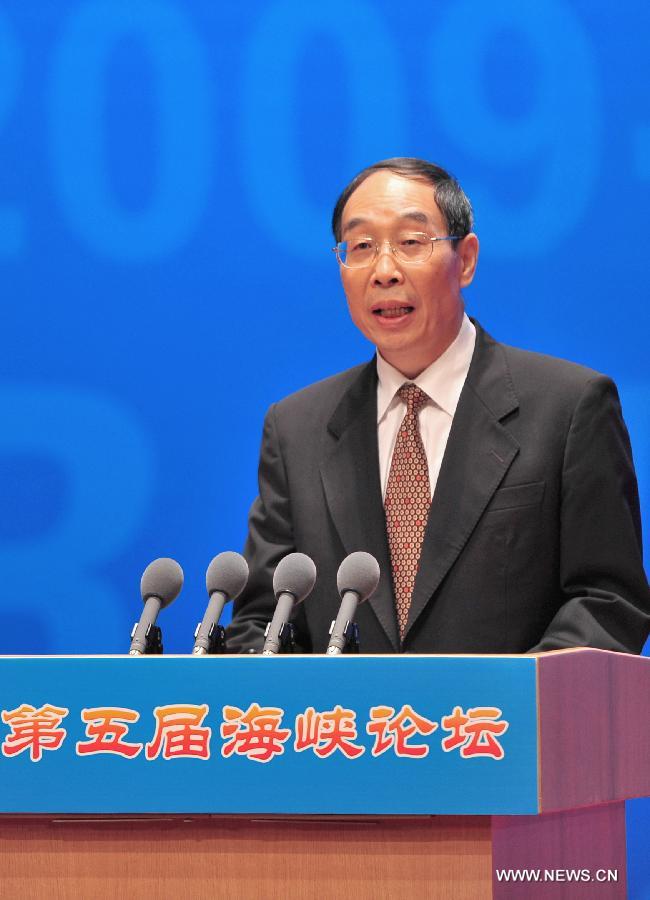 You Quan, secretary of the Fujian Provincial Committee of the Communist Party of China, addresses the conference of the Fifth Straits Forum in Xiamen of southeast China's Fujian Province, June 16, 2013. (Xinhua/Wei Peiquan) 
