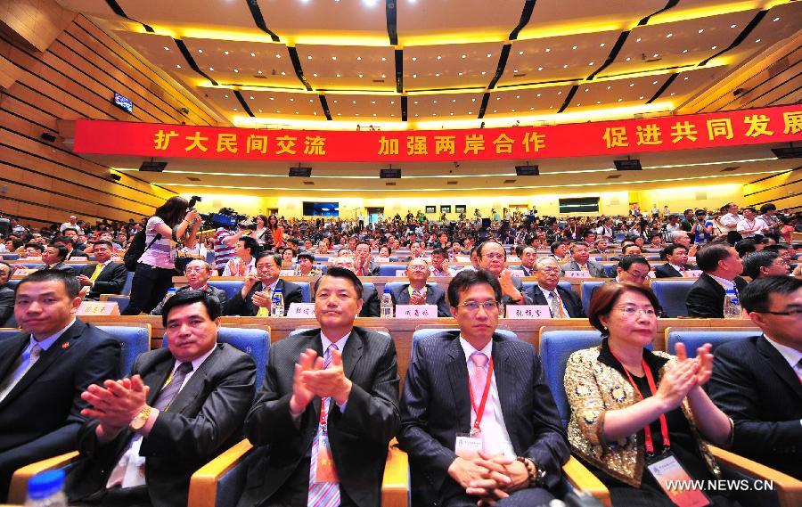 Guests attend the Fifth Straits Forum in Xiamen of southeast China's Fujian Province, June 16, 2013. (Xinhua/Wei Peiquan) 