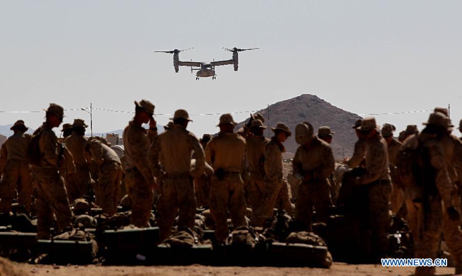 U.S. soldiers particiapte in the multinational training military exercise, codenamed Eager Lion, at the city of Quweira, 290 km south of Amman, Jordan, on June 16, 2013. (Xinhua/Mohammad Abu Ghosh)