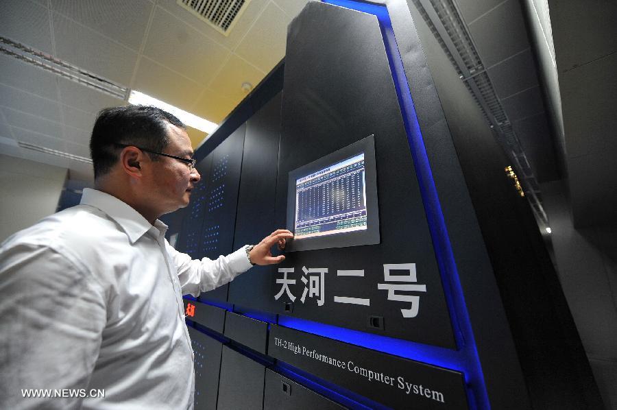 Photo taken on June 16, 2013 shows the supercomputer Tianhe-2 developed by China's National University of Defense Technology. The supercomputer Tianhe-2, capable of operating as fast as 33.86 petaflops per second, was ranked on Monday as the world's fastest computing system, according to TOP500, a project ranking the 500 most powerful computer systems in the world. (Xinhua/Long Hongtao)