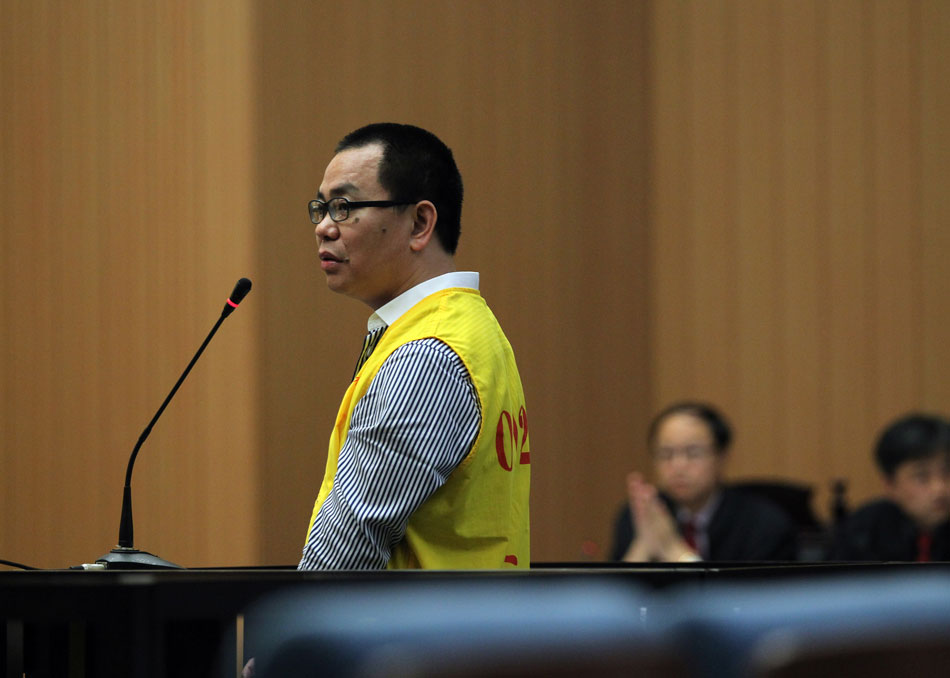 Lin Chunping, 43, stands trial for faking value-added tax invoices, which helped 315 companies evade about 76 million yuan ($12.23 million) in taxes, Wenzhou, southeast China’s Zhejiang province. Lin was in spotlight in 2011 when he claimed he had purchased the "Greater Atlantic Bank in Delaware." (Xinhua/Zheng Peng)