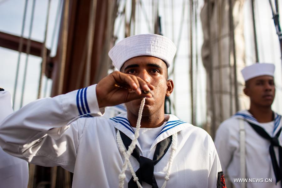 A Venezuelan solider whistles on the Army School boat Simon Bolivar after it arrived in Havana, capital of Cuba, June 17, 2013. This is the fourth visit of Simon Bolivar ship to Cuba. (Xinhua/Liu Bin) 