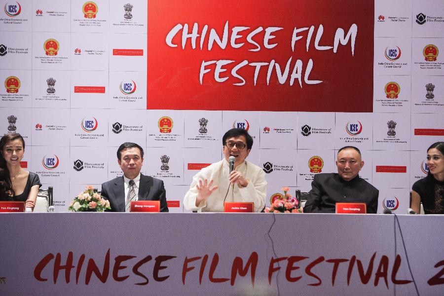 Actor Jackie Chan attends the news conference of the Chinese film festival in New Delhi, India, on June. 18, 2013. The 5-day festival opened on Tuesday to boost bilateral movie and culture cooperation between China and India. (Xinhua/Zheng Huansong)