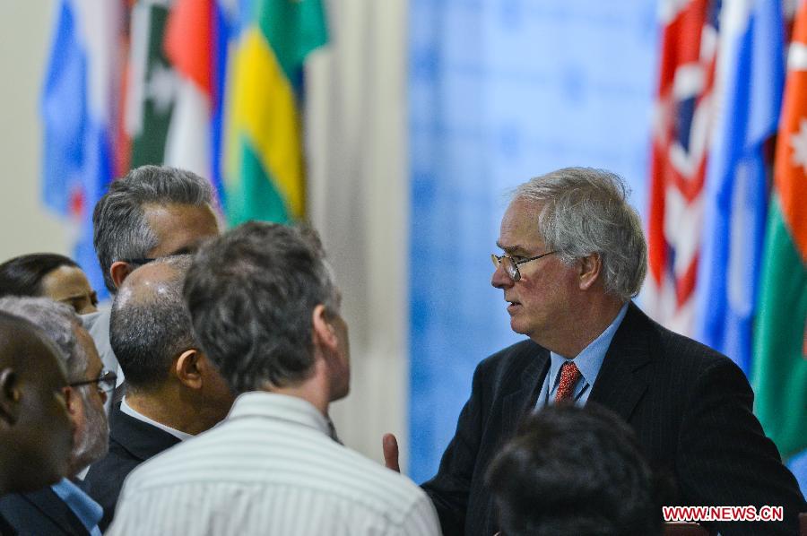 UK Permanent Representative to the United Nations Mark Lyall Grant (1st R), whose country holds the rotating presidency of the UN Security Council for the month of June, speaks to journalists at the UN headquarters in New York, on June 19, 2013. The UN Security Council on Wednesday voiced its outrage by the attack on a UN compound in Mogadishu, Somalia, which caused numerous deaths and injuries. Suicide bombers attacked the UN's office in Mogadishu on Wednesday, leaving at least 15 people dead, including eight working for the UN. The al-Qaida linked militant Al-Shabaab group said it was behind the assault. (Xinhua/Niu Xiaolei) 