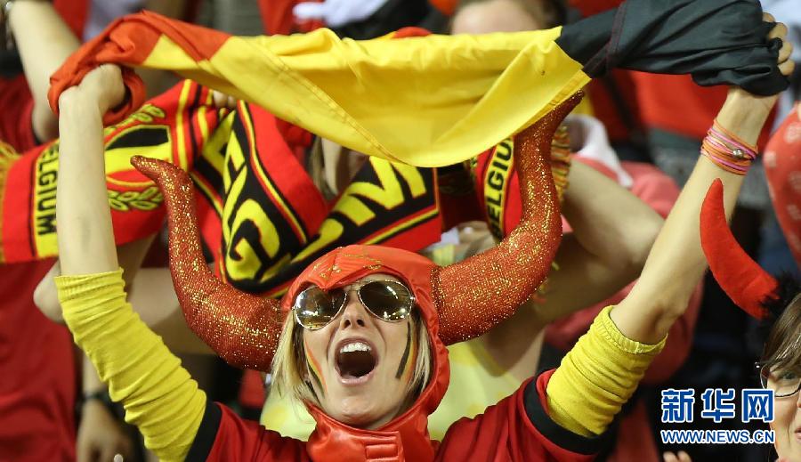 Belgium female fans cheer for the team during the 2014 World Cup Qualifying football match between Belgium and Serbia at the King Baudouin stadium in Brussels, capital of Belgium, on June 7, 2013. Belgium won the match 2-1. (Photo/Xinhua)