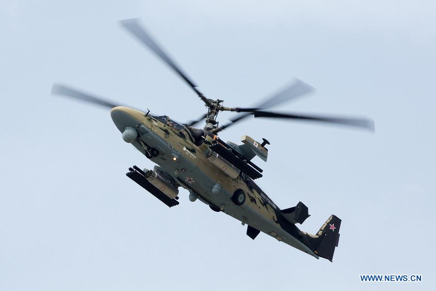 A Russian Ka-52 military helicopter participates in a flying display during the 50th International Paris Air Show at the Le Bourget airport in Paris, France, June 18, 2013. The Paris Air Show runs from June 17 to 23. (Xinhua/Chen Cheng)