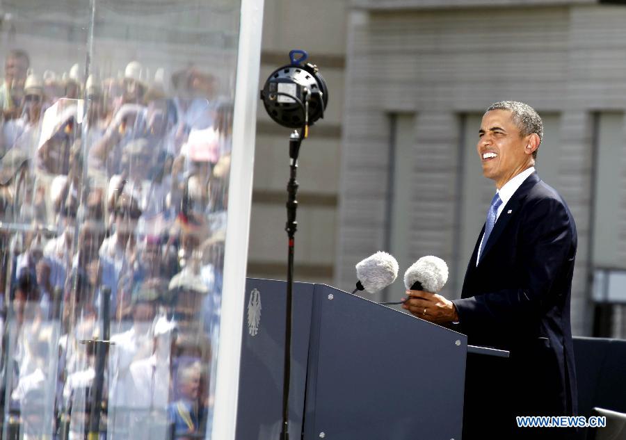 U.S. President Barack Obama delivers a speech at the Brandenburg Gate in Berlin, Germany, June 19, 2013. Obama arrived in Berlin on June 18 for an official visit. (Xinhua/Pan Xu)