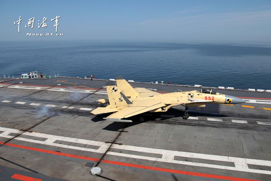 Taking-off, landing exercises of J-15 fighter jets on Liaoning (Photo: chinamil.com.cn)