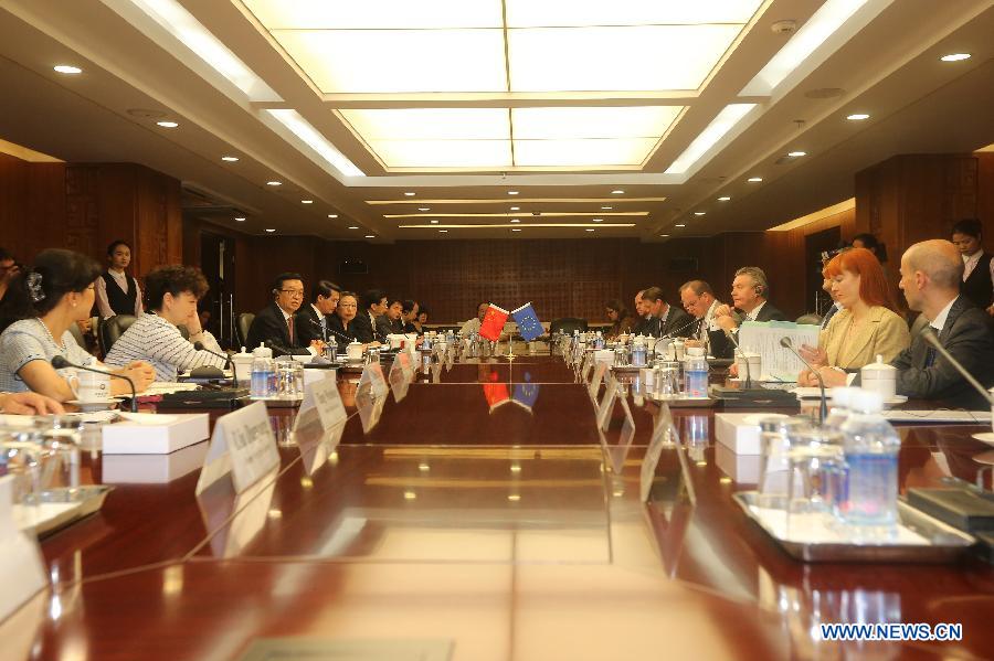 The 27th China-European Union (EU) Economic and Trade Joint Committee meeting is held in Beijing, capital of China, June 21, 2013. (Xinhua/Xing Guangli)