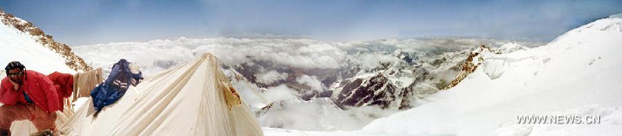 Chinese mountaineers establish camps at Tomor Peak of the Tianshan in northwest China's Xinjiang Uygur Autonomous Region, in 1977. The 37th session of UNESCO's World Heritage Committee (WHC) inscribed China's Xinjiang Tianshan on the World Heritage List as a natural site on June 21, 2013. Xinjiang Tianshan is a serial property totaling 606,833 hectares and consisting of four components which are located along the 1,760 km Tianshan range, a temperate arid zone surrounded by Central Asian deserts. (Xinhua) 