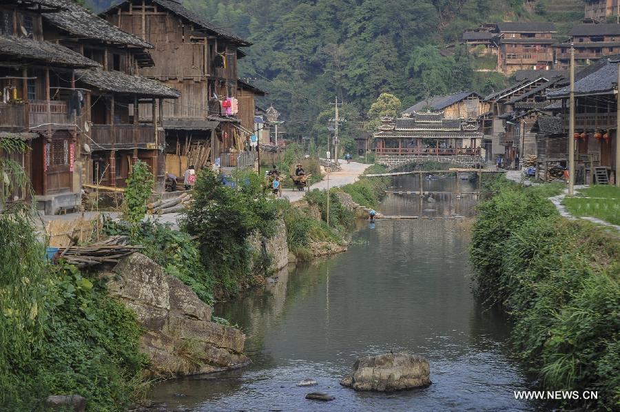 Photo taken on June 20, 2013 shows the scenery of Dimen Dong minority village in Liping County of southwest China's Guizhou Province. Dimen is a Dong minority village with about 2,500 villagers. It is protected properly and all the villagers could enjoy their peaceful and quiet rural life as they did in the past over 700 years. (Xinhua/Ou Dongqu) 