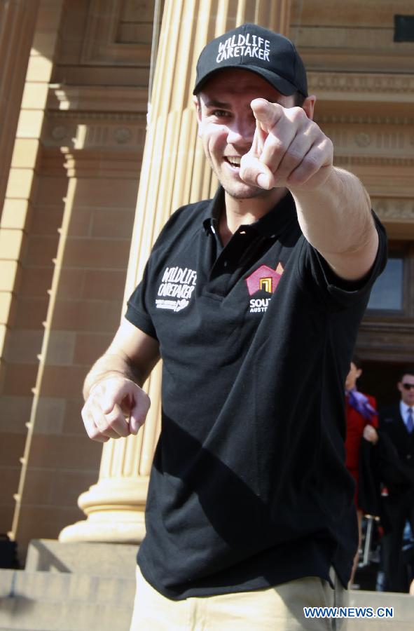 Greg Snell from Canada cheers after winning the job 'Wildlife Caretaker in South Australia' in Sydney, Australia, on June 21, 2013. Six young men and women have beaten off more than 330,000 competitors from 196 countries and regions to be awarded Tourism Australia's 'Best Jobs in the World'. They are expected to commence their jobs between August and December 2013. Tourism Australia's 'Best Jobs in the World' competition is part of a major international marketing push to promote tourism opportunities provided by Australia's Working Holiday Maker program. (Xinhua/Jin Linpeng) 