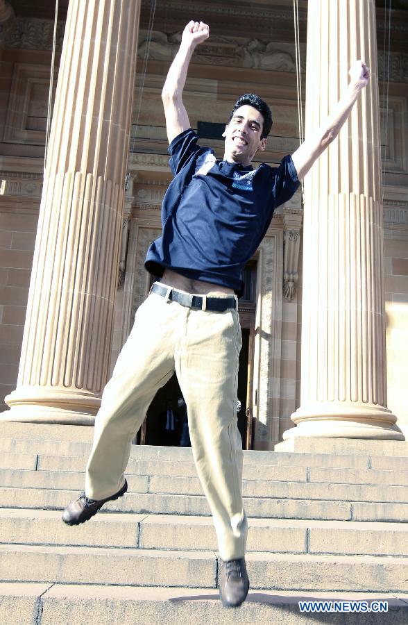 Roberto Seba from Brazil cheers after winning the job 'Lifestyle Photographer in Melbourne' in Sydney, Australia, on June 21, 2013. Six young men and women have beaten off more than 330,000 competitors from 196 countries and regions to be awarded Tourism Australia's 'Best Jobs in the World'. They are expected to commence their jobs between August and December 2013. Tourism Australia's 'Best Jobs in the World' competition is part of a major international marketing push to promote tourism opportunities provided by Australia's Working Holiday Maker program. (Xinhua/Jin Linpeng) 