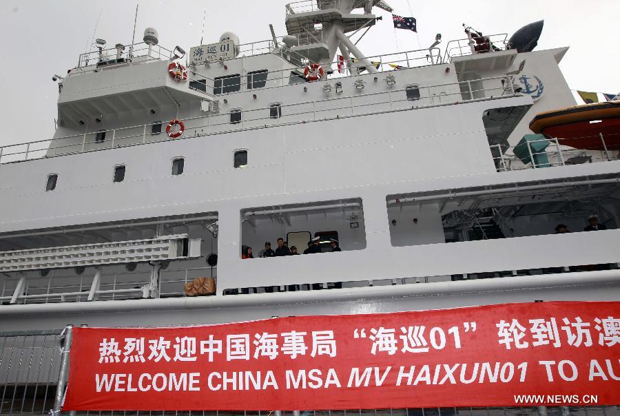 China's search and rescue vessel "Haixun 01" docks at the port in Sydney, Australia, June 22, 2013. China's largest search-and-rescue vessel "Haixun 01" arrived at Sydney's Garden Island port Saturday on its first international voyage. (Xinhua/Jin Linpeng) 